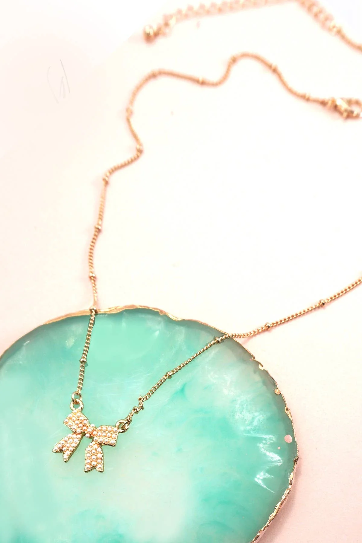 Pearl Bow Charm Necklace - Image 2